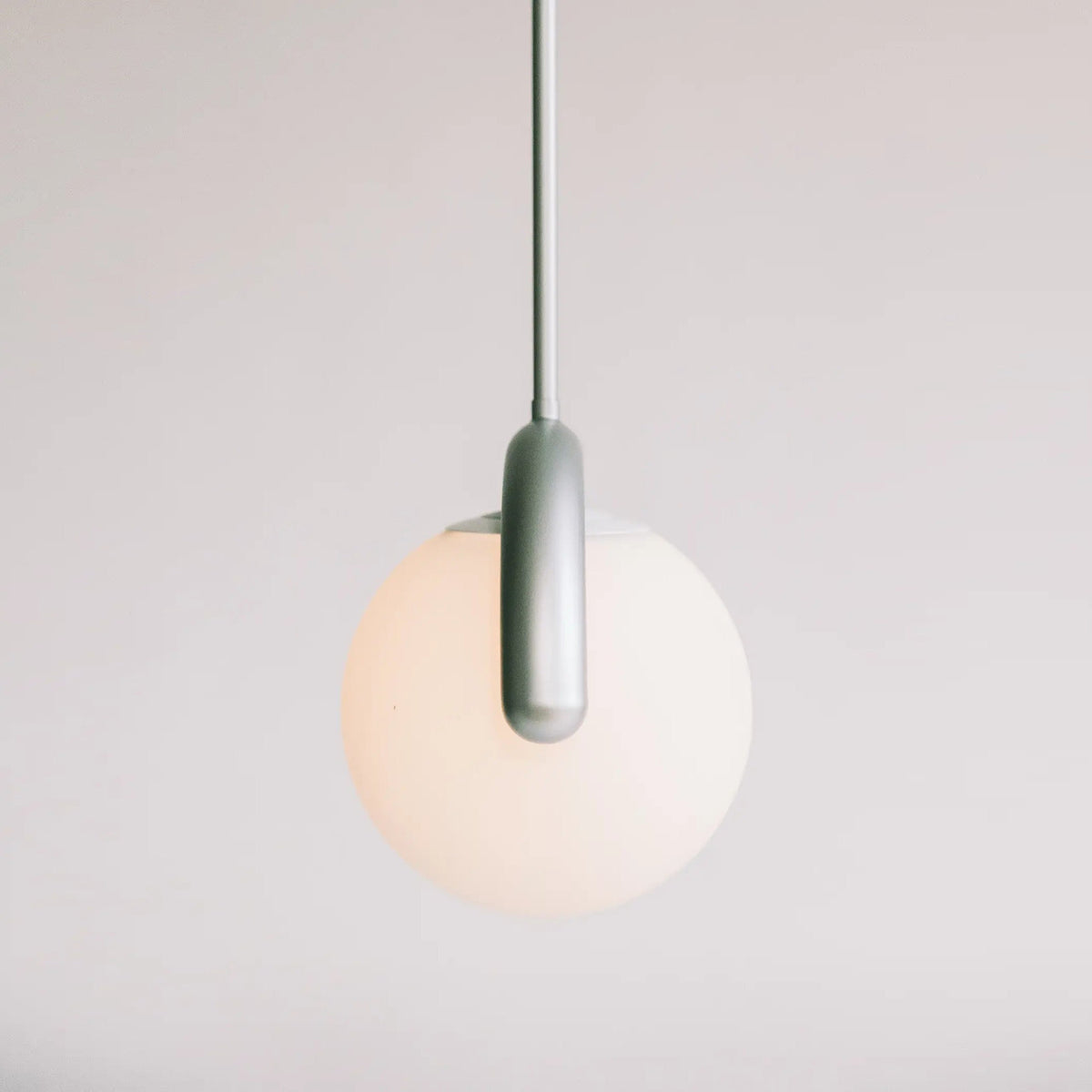 Curved Wave Linear Chandelier with Opal Glass Globes - Arrielight