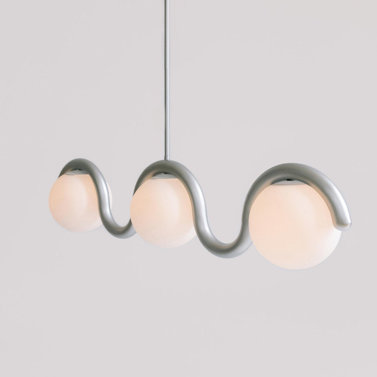 Curved Wave Linear Chandelier with Opal Glass Globes - Arrielight