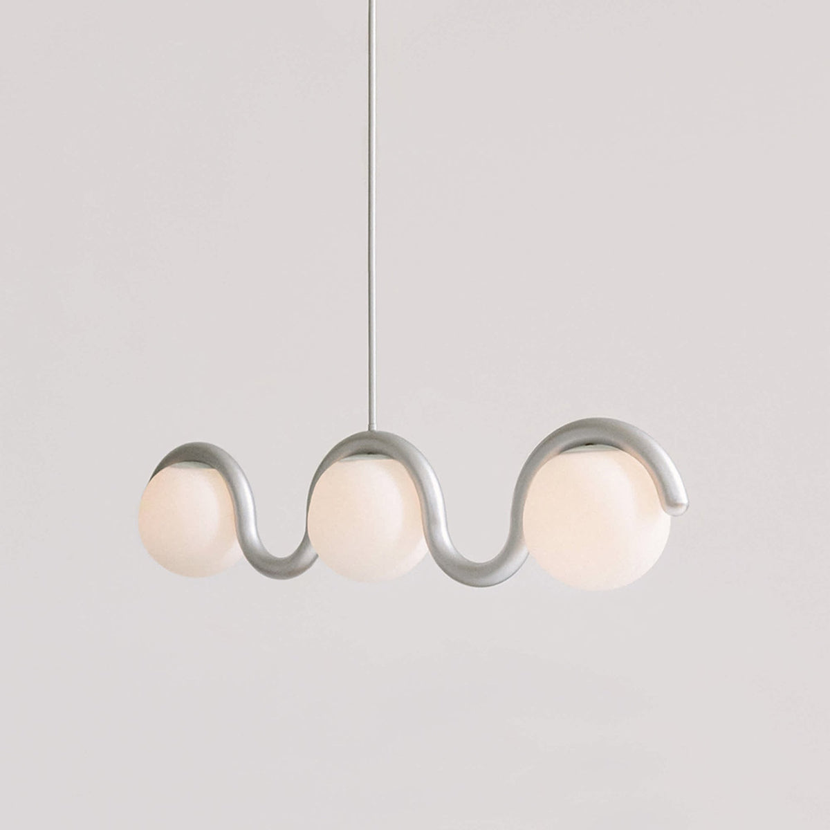 Curved Wave Linear Chandelier with Opal Glass Globes - Arrielight