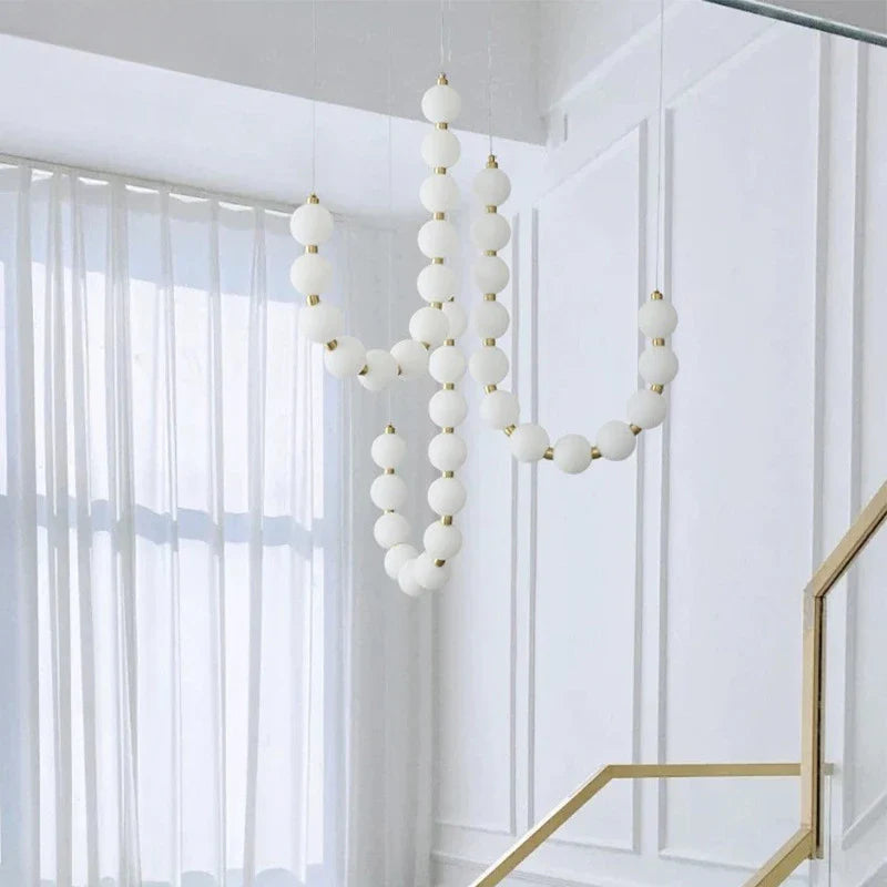 Modern LED Pendant Light – Necklace-Inspired Design with Glowing Spheres