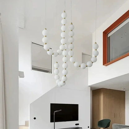 Modern LED Pendant Light – Necklace-Inspired Design with Glowing Spheres