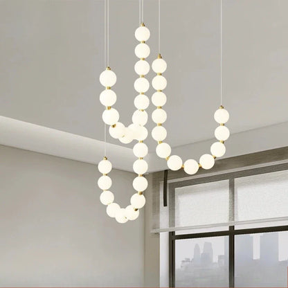Modern LED Pendant Light – Necklace-Inspired Design with Glowing Spheres