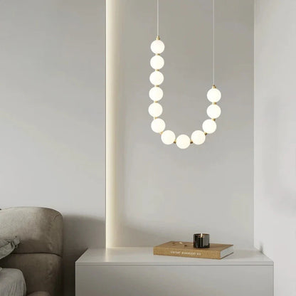 Modern LED Pendant Light – Necklace-Inspired Design with Glowing Spheres
