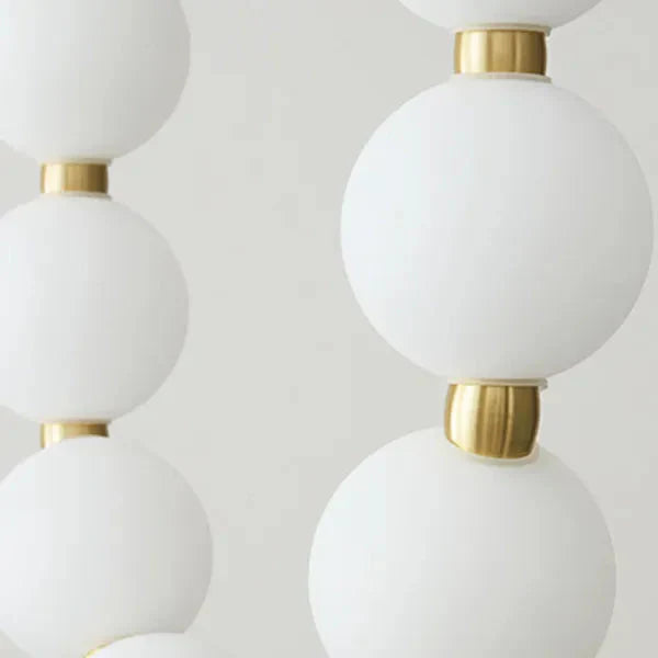 Modern LED Pendant Light – Necklace-Inspired Design with Glowing Spheres