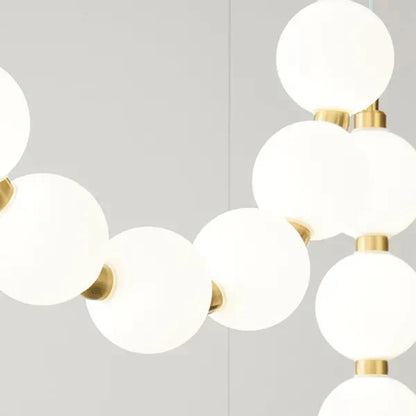Modern LED Pendant Light – Necklace-Inspired Design with Glowing Spheres