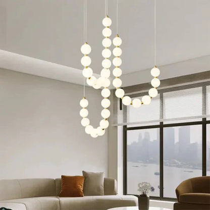 Modern LED Pendant Light – Necklace-Inspired Design with Glowing Spheres