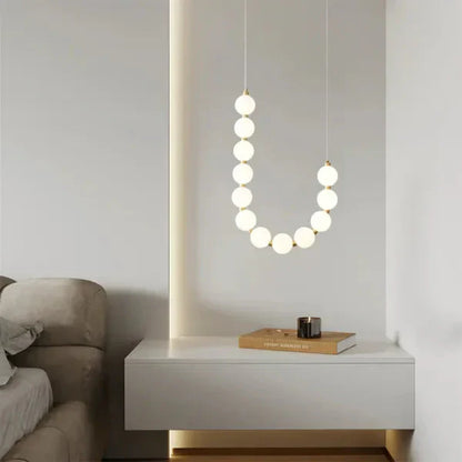 Modern LED Pendant Light – Necklace-Inspired Design with Glowing Spheres