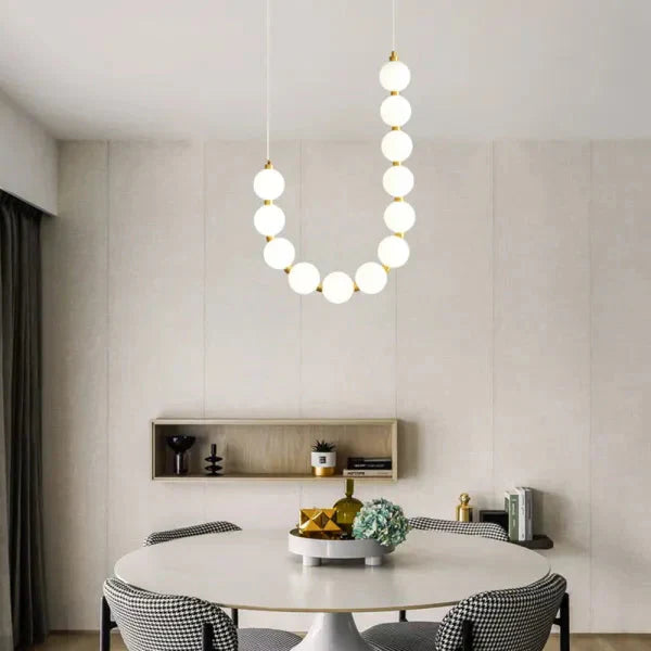 Modern LED Pendant Light – Necklace-Inspired Design with Glowing Spheres