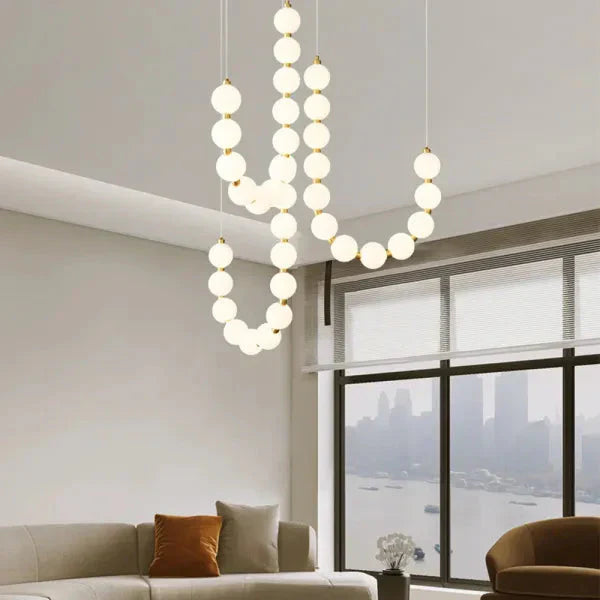 Modern LED Pendant Light – Necklace-Inspired Design with Glowing Spheres