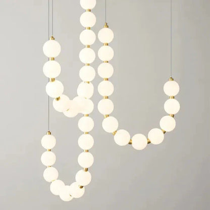 Modern LED Pendant Light – Necklace-Inspired Design with Glowing Spheres