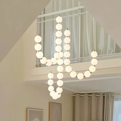 Modern LED Pendant Light – Necklace-Inspired Design with Glowing Spheres